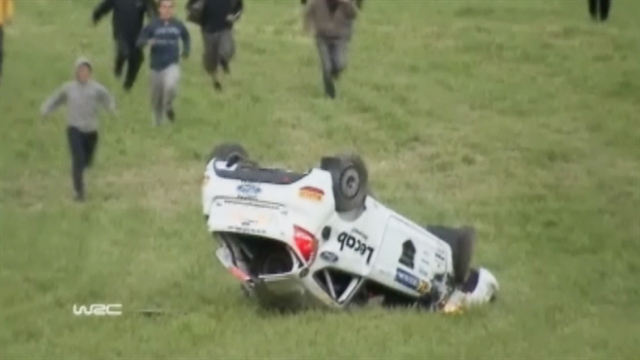On tape: Race car crashes, lands upside-down