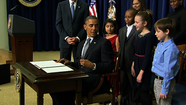 Politics: Obama signs orders to help prevent gun violence
