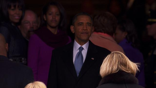 Politics: Obama takes in inauguration crowd