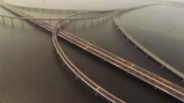World's longest cross-sea bridge opens in China