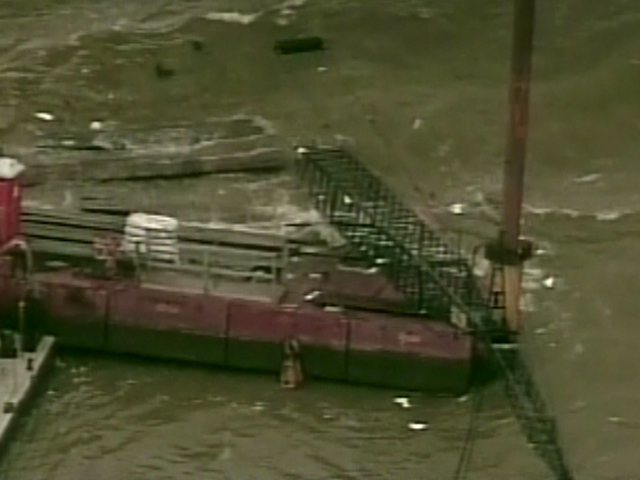 Crane Sinks In Texas Lake