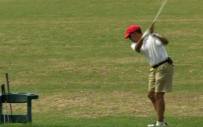 Obama Takes A Swing