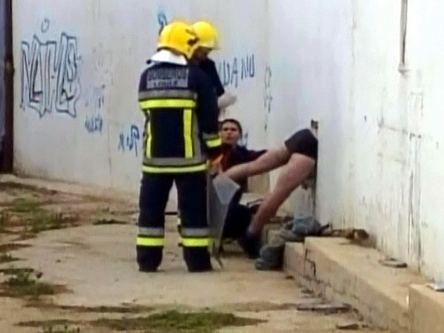Thief Gets Stuck in Window