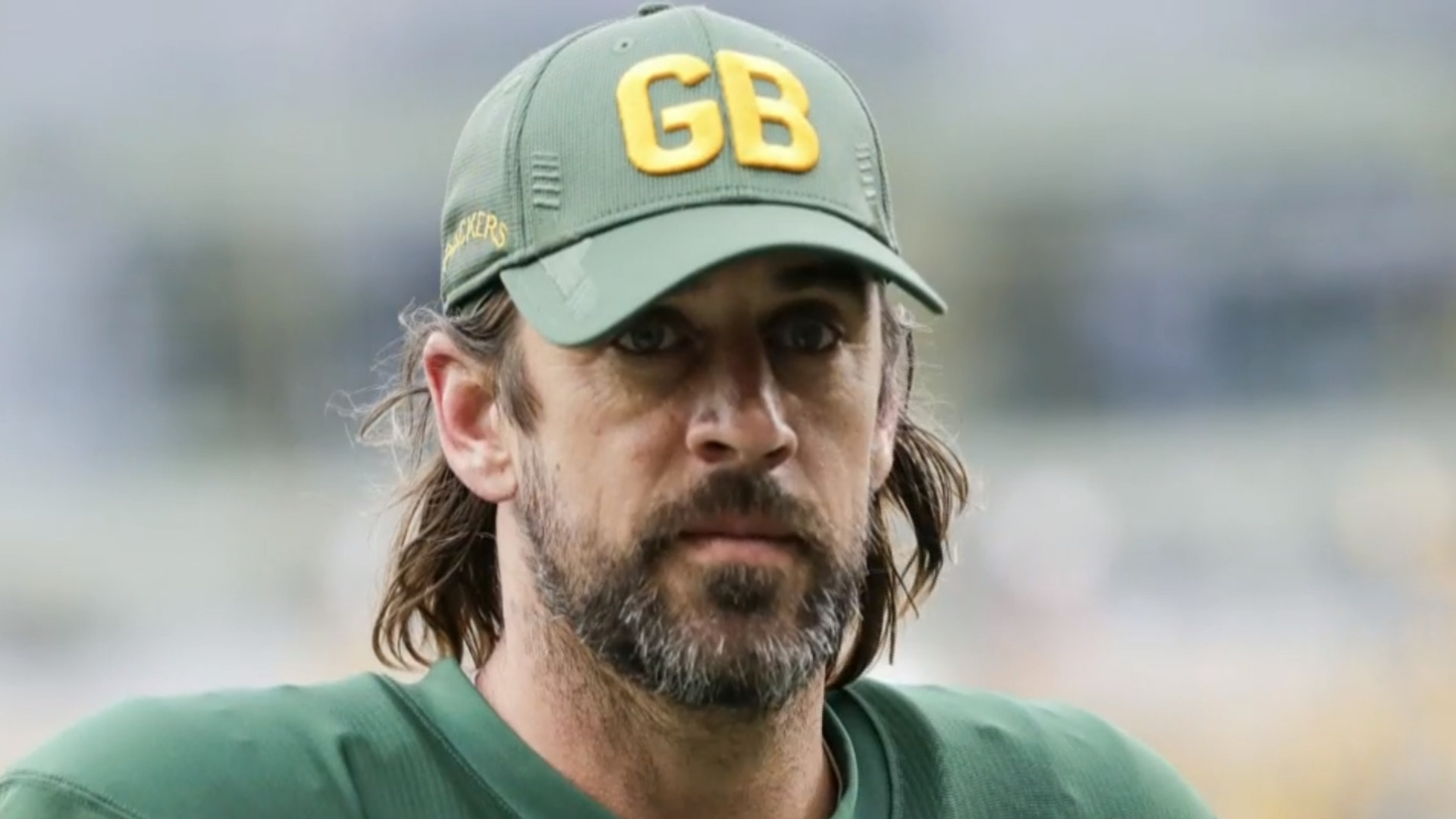 Green Bay Packers quarterback Aaron Rodgers returns after positive