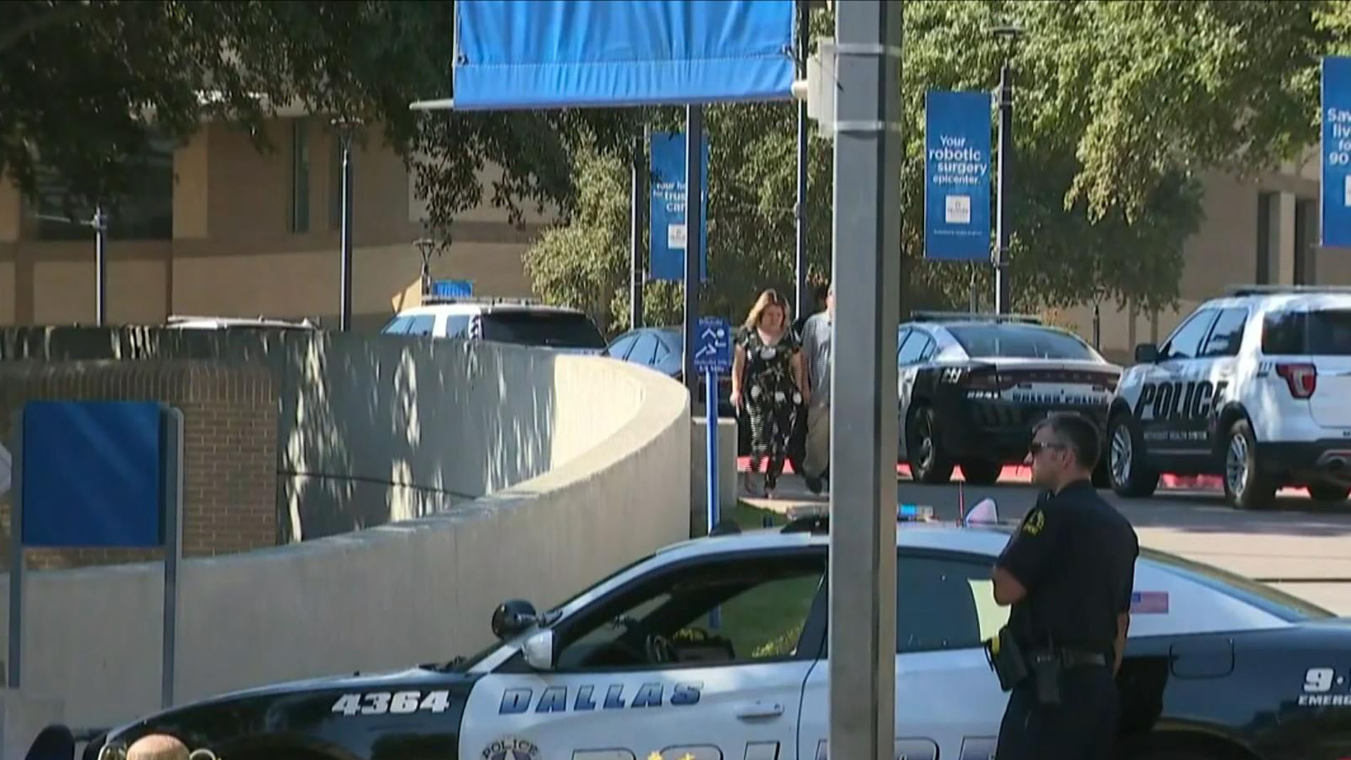 Watch CBS Evening News 2 employees shot, killed in Dallas hospital(00)