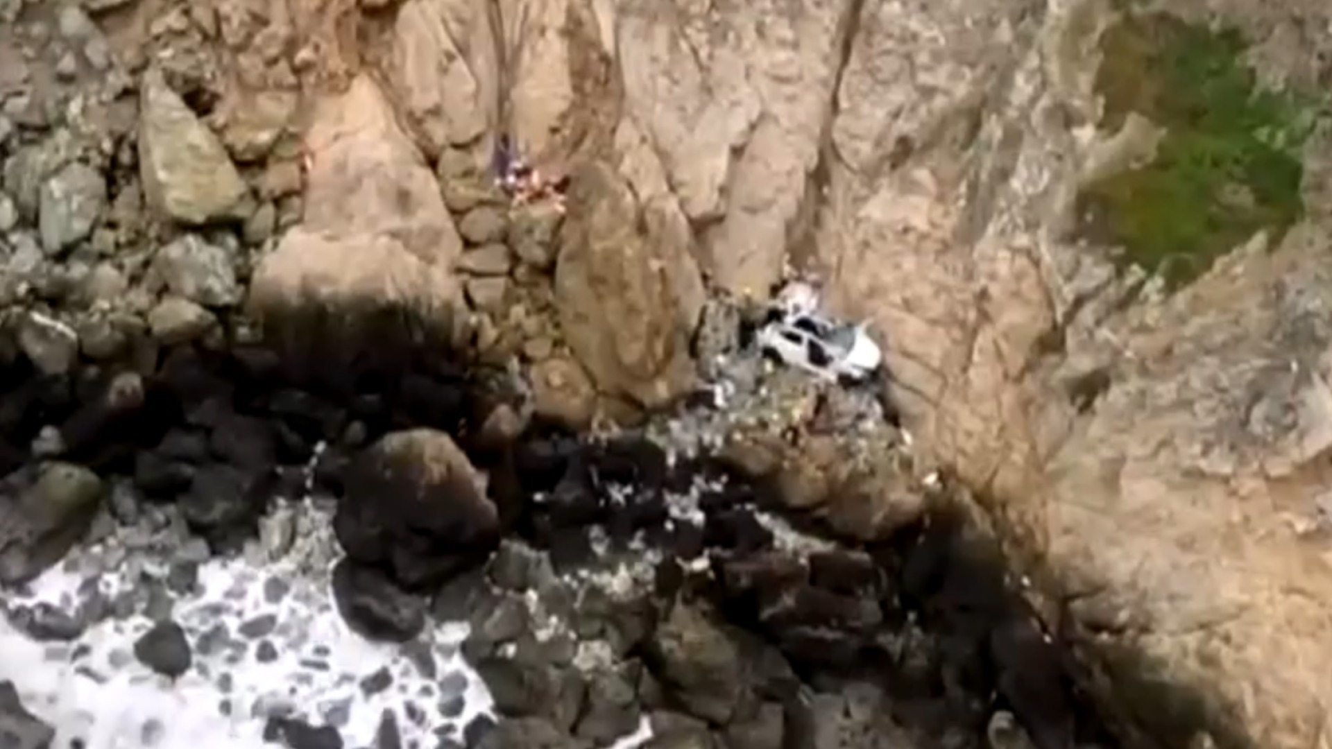Watch CBS Evening News 4 rescued after Tesla plunges off cliff Full