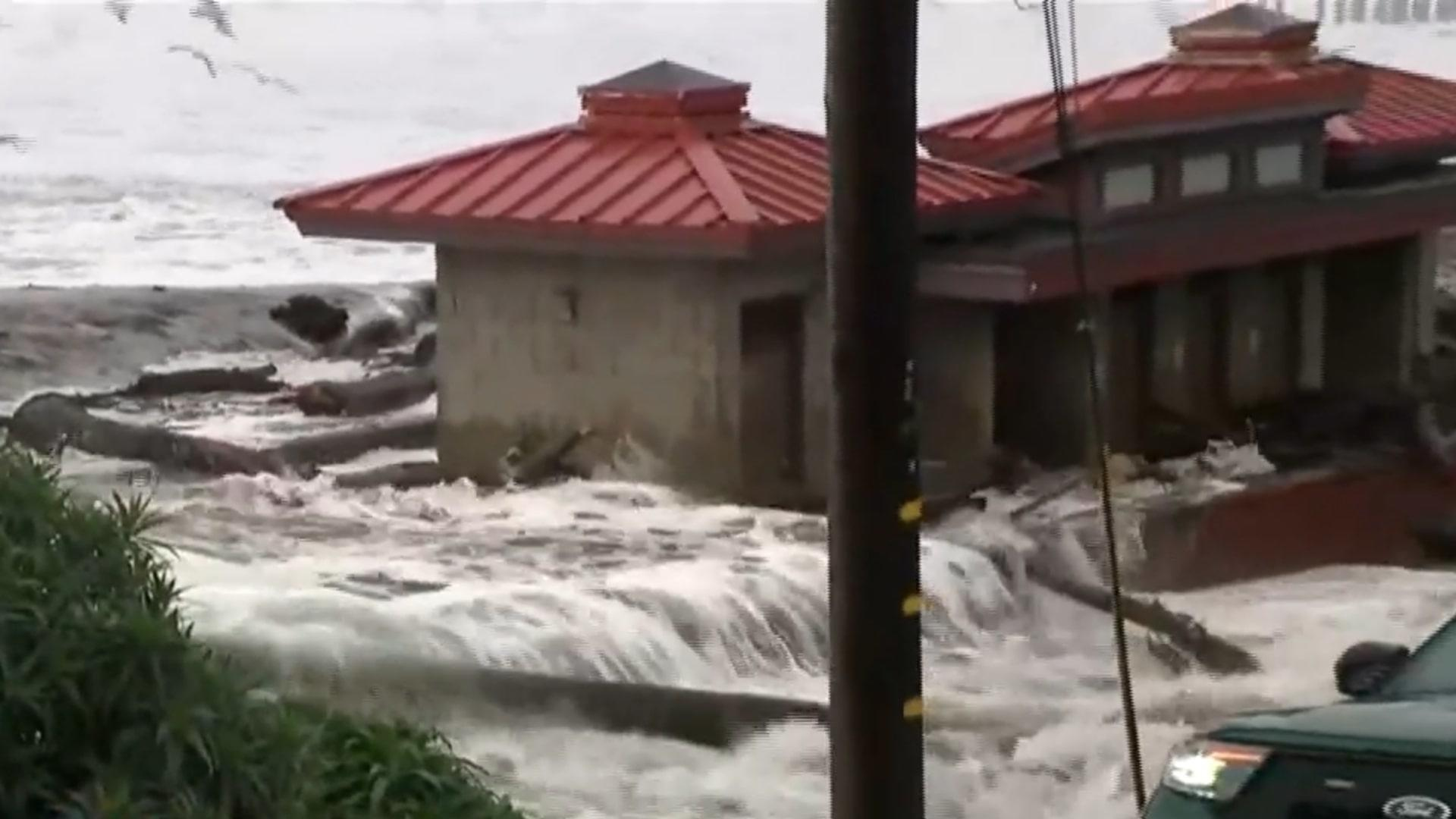 Watch CBS Evening News: Massive waves, flooding pummel West Coast ...