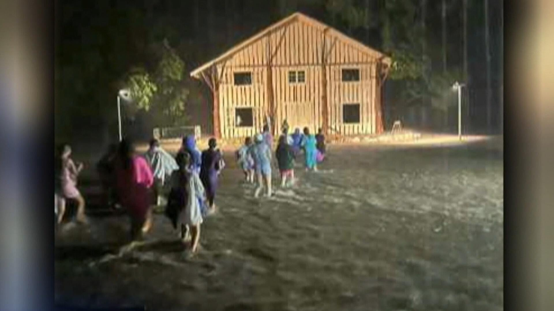 Floods kill at least 13 in Texas, over 20 missing