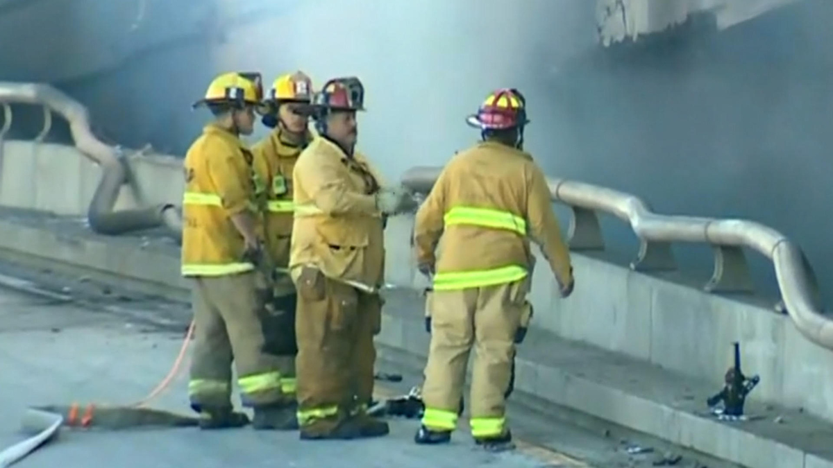 Watch CBS Evening News: Massive fire shuts down Los Angeles freeway ...