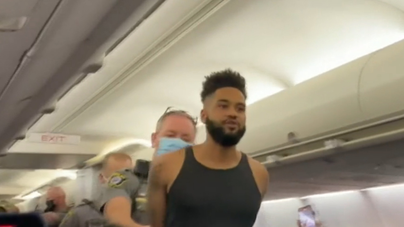 Watch CBS Evening News: Delta flight diverted due to unruly passenger