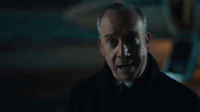 Billions : L'uomo con la maglietta verde oliva'