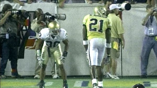 Origin Games - Notre Dame's Brady Quinn Fends Off Calvin Johnson 2006