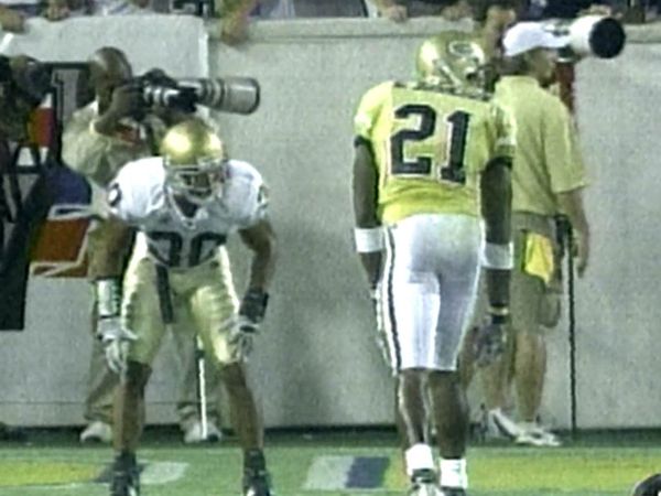 Origin Games - Notre Dame's Brady Quinn Fends Off Calvin Johnson 2006