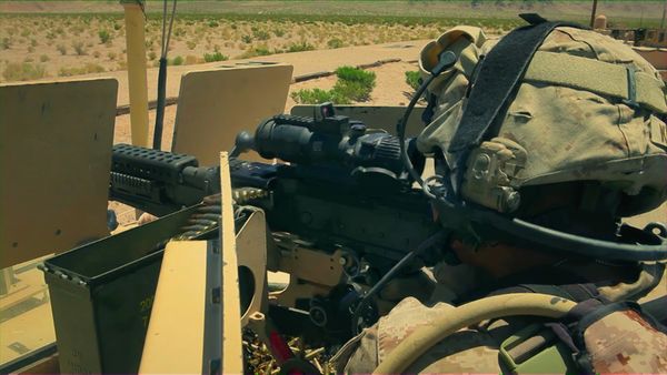 Battle Factory - Camouflage Makeup, a Machine Gun, and an Amphibious Military ATV