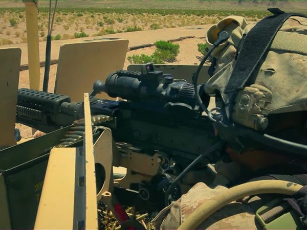 Battle Factory - Camouflage Makeup, a Machine Gun, and an Amphibious Military ATV