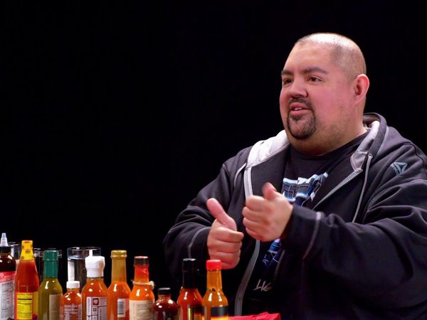Hot Ones - Gabriel Iglesias Does Wrestling Trivia While Eating Spicy Wings
