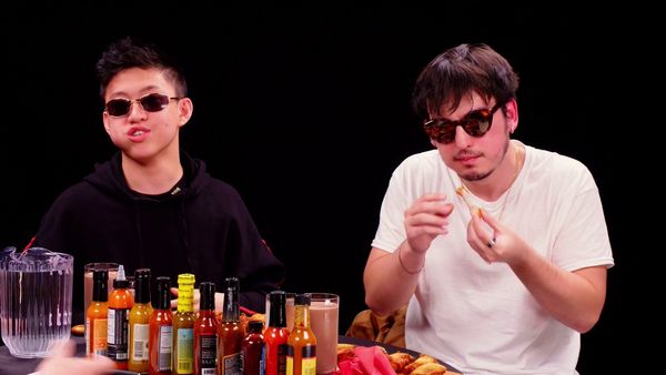 Hot Ones - Joji and Rich Brian Play the Newlywed Game While Eating Spicy Wings