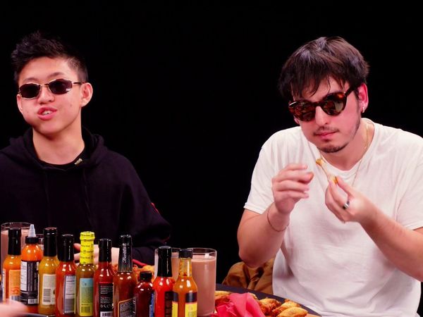 Hot Ones - Joji and Rich Brian Play the Newlywed Game While Eating Spicy Wings