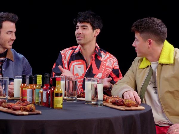 Hot Ones - The Jonas Brothers Burn Up While Eating Spicy Wings