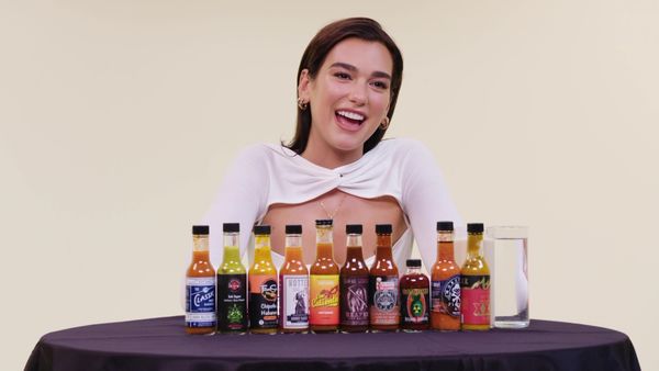 Hot Ones - Dua Lipa Sweats From Her Eyes While Eating Spicy Wings