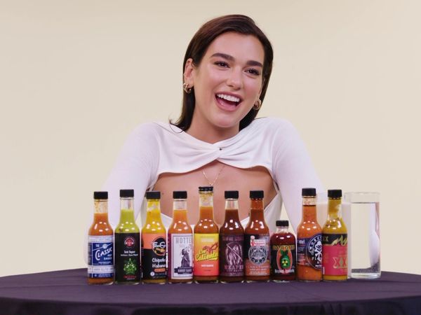 Hot Ones - Dua Lipa Sweats From Her Eyes While Eating Spicy Wings