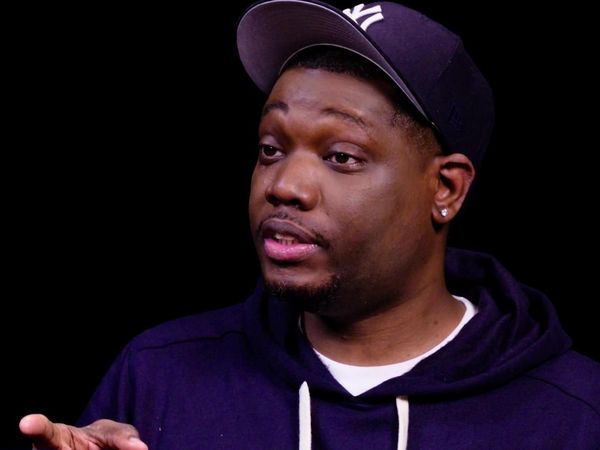 Hot Ones - Michael Che Gs Up While Eating Spicy Wings