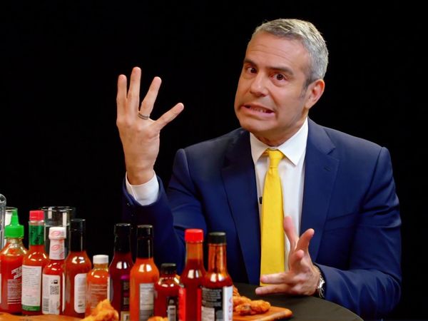 Hot Ones - Andy Cohen Spills the Tea While Eating Spicy Wings