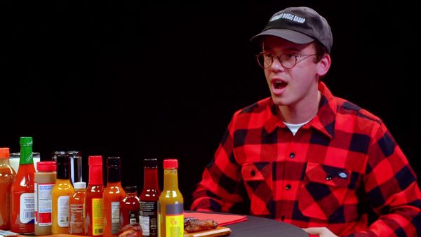 Hot Ones - Logic Solves a Rubik's Cube While Eating Spicy Wings
