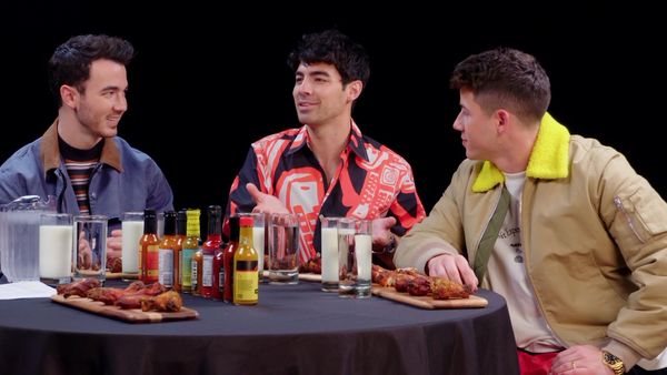 Hot Ones - The Jonas Brothers Burn Up While Eating Spicy Wings
