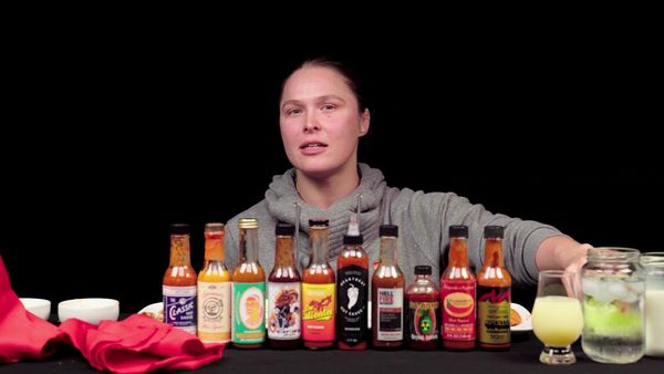Hot Ones - Ronda Rousey Splits Bones While Eating Spicy Wings