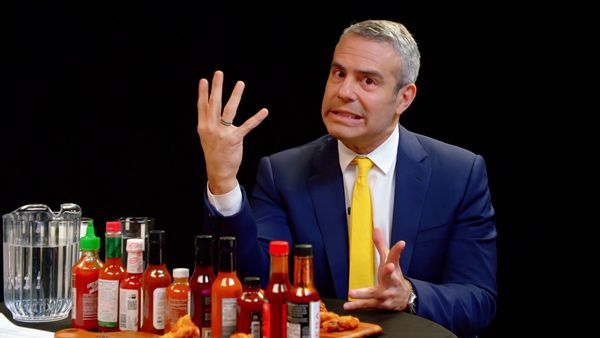 Hot Ones - Andy Cohen Spills the Tea While Eating Spicy Wings