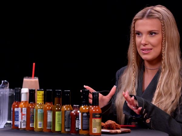 Hot Ones - Millie Bobby Brown Needs a Milkshake While Eating Spicy Wings