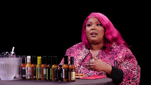 Hot Ones - Lizzo Earns Her Hot Sauce Crown While Eating Spicy Wings