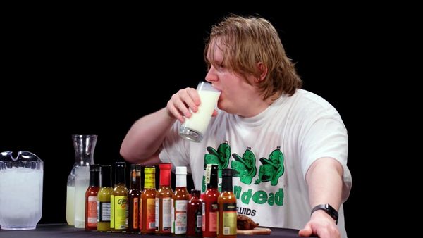 Hot Ones - Lewis Capaldi Grasps for a Lifeline While Eating Spicy Wings