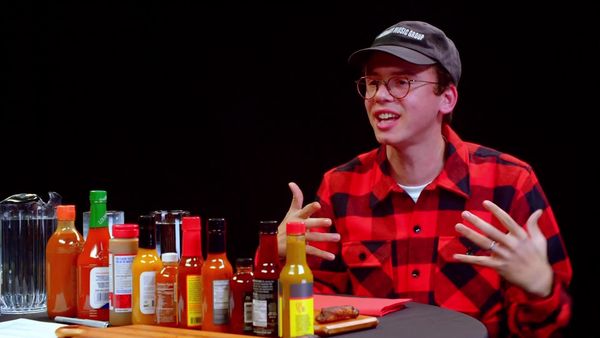 Hot Ones - Logic Solves a Rubik's Cube While Eating Spicy Wings
