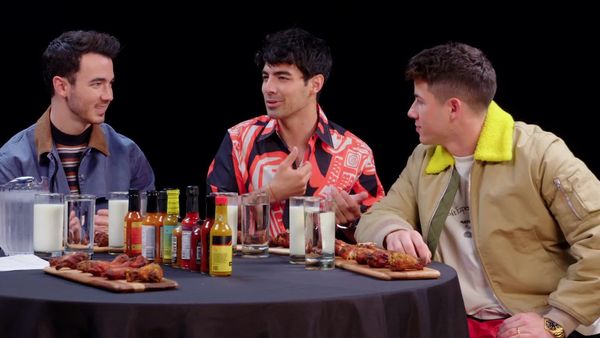 Hot Ones - The Jonas Brothers Burn Up While Eating Spicy Wings