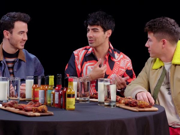 Hot Ones - The Jonas Brothers Burn Up While Eating Spicy Wings