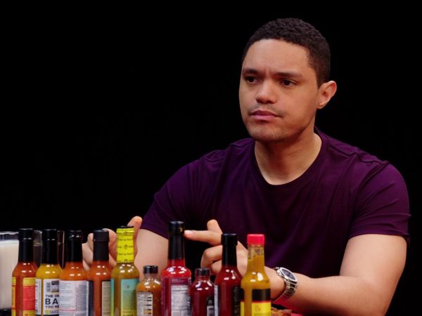 Hot Ones - Trevor Noah Rides a Pain Rollercoaster While Eating Spicy Wings