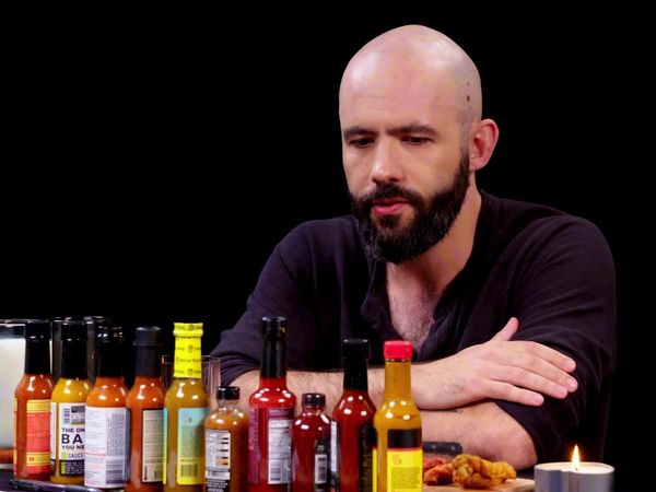 Hot Ones - Binging with Babish Gets a Tattoo While Eating Spicy Wings