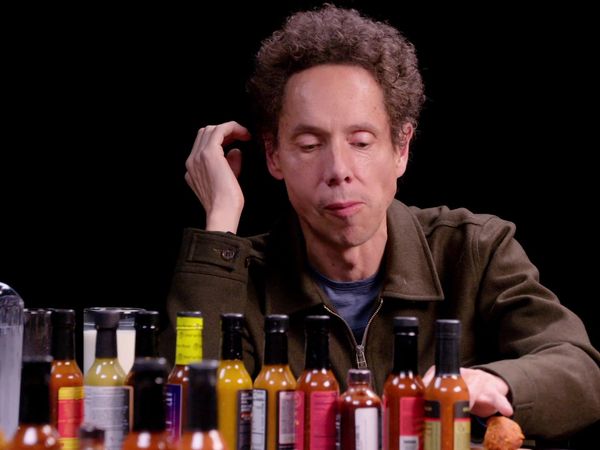 Hot Ones - Malcolm Gladwell Hits the Tipping Point While Eating Spicy Wings