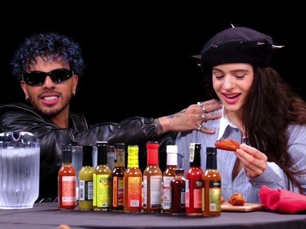 Hot Ones - Rosalía Can't Stop Laughing While Eating Spicy Wings