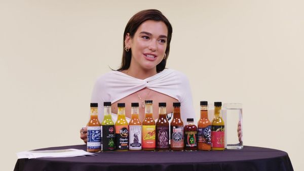 Hot Ones - Dua Lipa Sweats From Her Eyes While Eating Spicy Wings