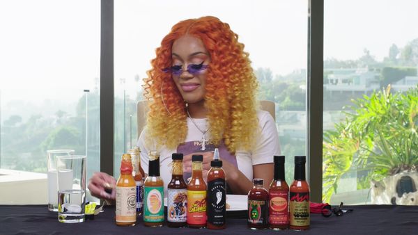 Hot Ones - Saweetie Almost Tap Tap Taps Out While Eating Spicy Wings