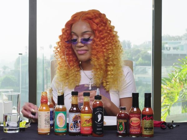 Hot Ones - Saweetie Almost Tap Tap Taps Out While Eating Spicy Wings