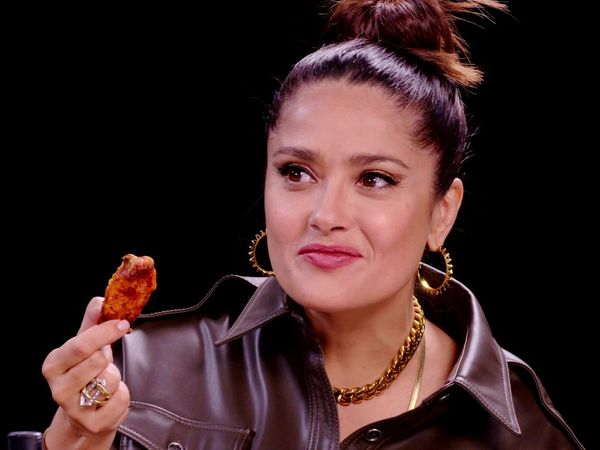 Hot Ones - Salma Hayek Adopts Sean Evans While Eating Spicy Wings