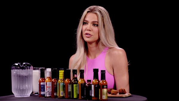 Hot Ones - Khloe Kardashian Holds Back Tears While Eating Spicy Wings