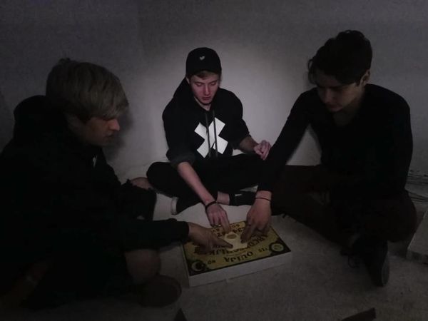 Sam and Colby - Using a Ouija Board and Satan's Cross